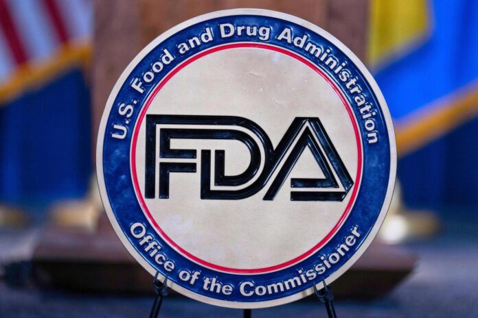 FDA says drug makers have recalled a blood pressure medicine tainted with a cancer-causing chemical