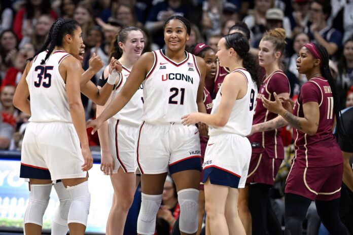 UConn women raise championship banner, then Strong and Fudd lead charge in rout of Florida State