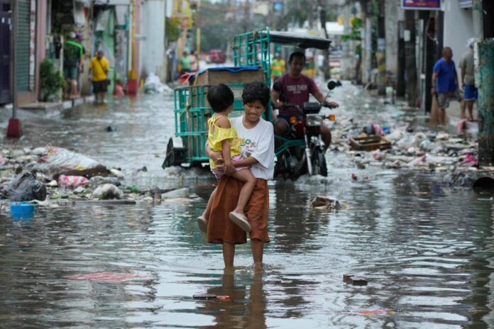 Typhoon Fung-wong blows away from the Philippines, leaving 8 dead and 1.4 million displaced