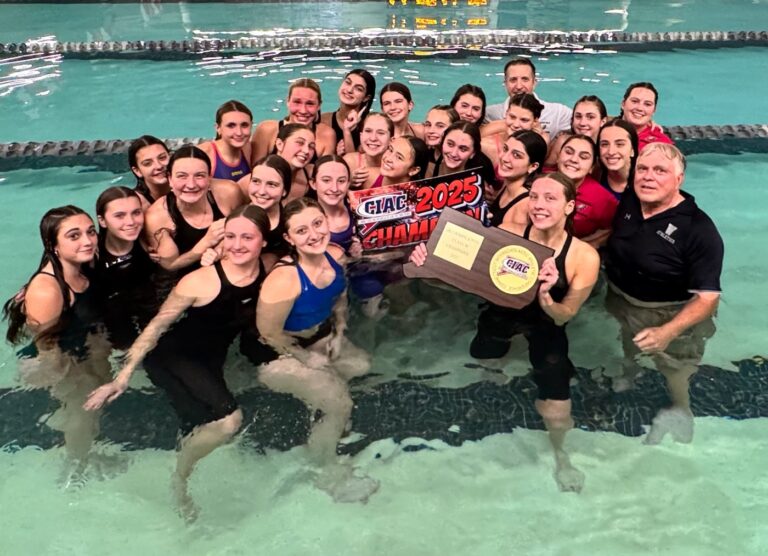 It took awhile, but this CT girls swim coach finally got his bath after winning a state title