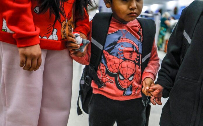 ‘A sad, cruel moment’: 58 Florida children leave US amid parent deportations