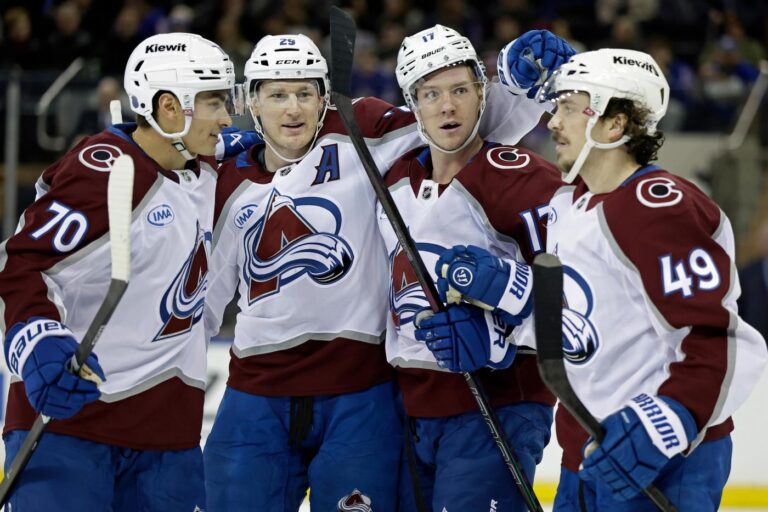 MacKinnon scores twice as the Avalanche beat the Rangers 3-2 in overtime