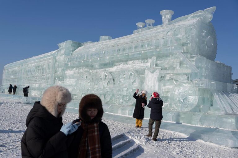 Harbin ice festival draws sculptors and spectators to northern China, in photos