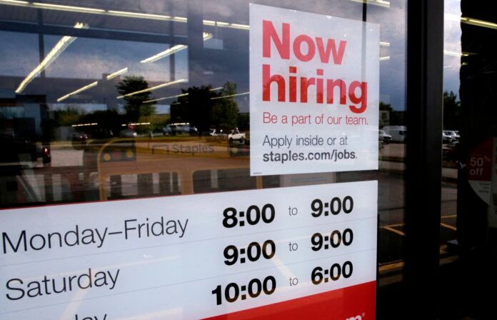 US payrolls rise a below-forecast 50,000, unemployment lower