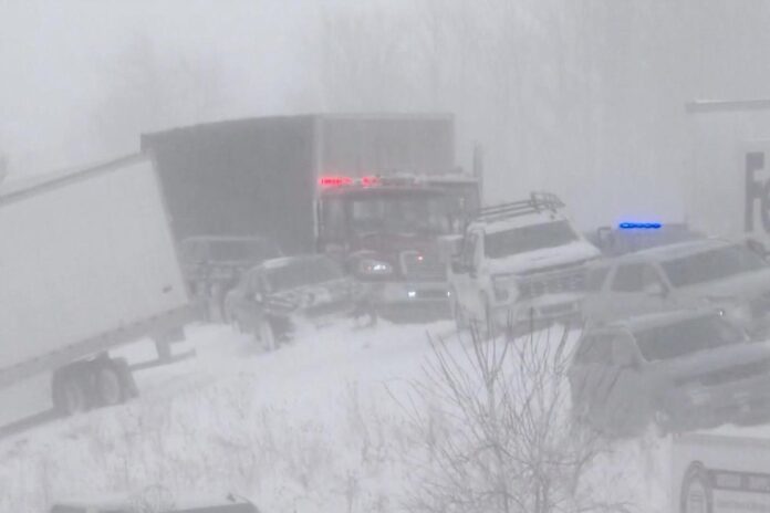 100 vehicles pile up in Michigan crash as snowstorm moves across the country