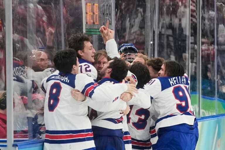 Dom Amore: Proud, emotional day for UConn hockey coach as Thompson, Team USA strike gold