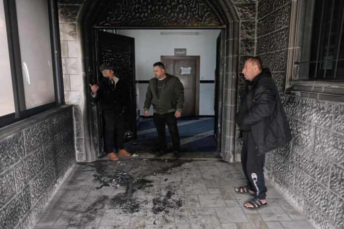 Israeli settlers torch and deface a West Bank mosque as Ramadan begins