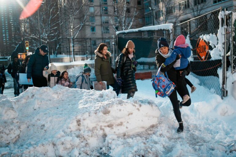Northeast US digs out from brutal snowstorm that disrupted flights and canceled school