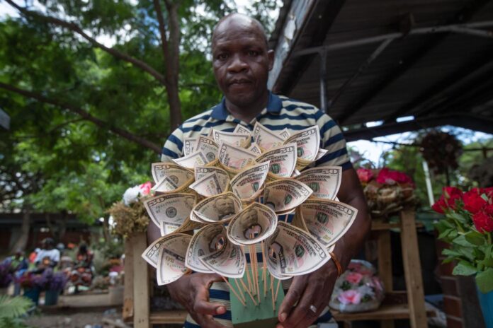 ‘Money bouquets’ rival traditional flowers as coveted tokens of love for Valentine’s Day in Zimbabwe