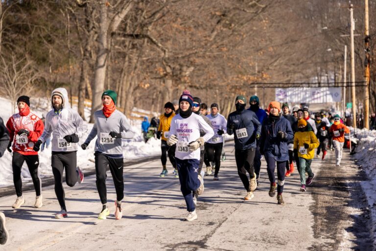 More than a thousand runners brave single-digit temps to run for refugees