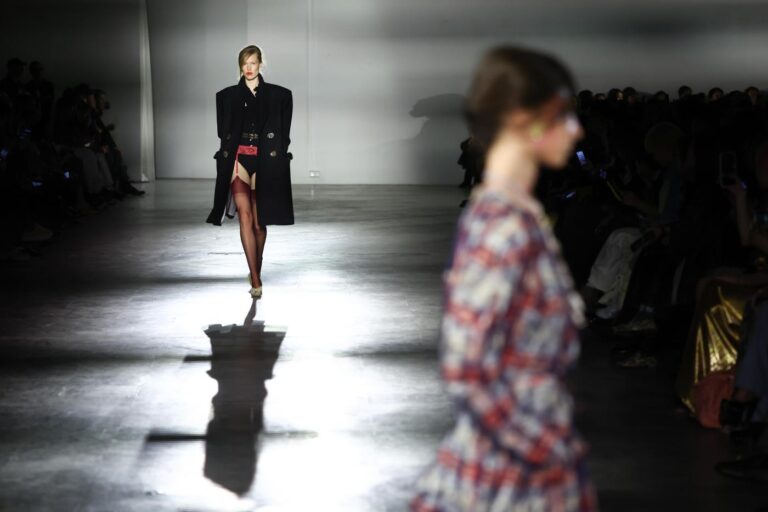 Stars hit Paris runways, but fall’s real trend was dressing for hard times — and real life