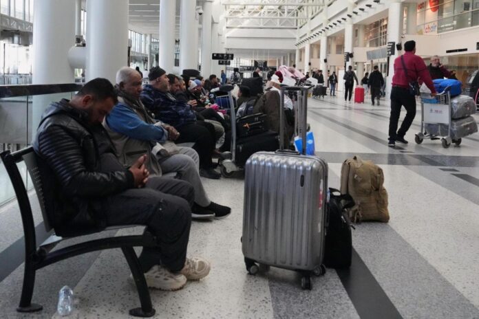 Stranded travelers scramble to make new connections as war shuts much of Middle East to air travel
